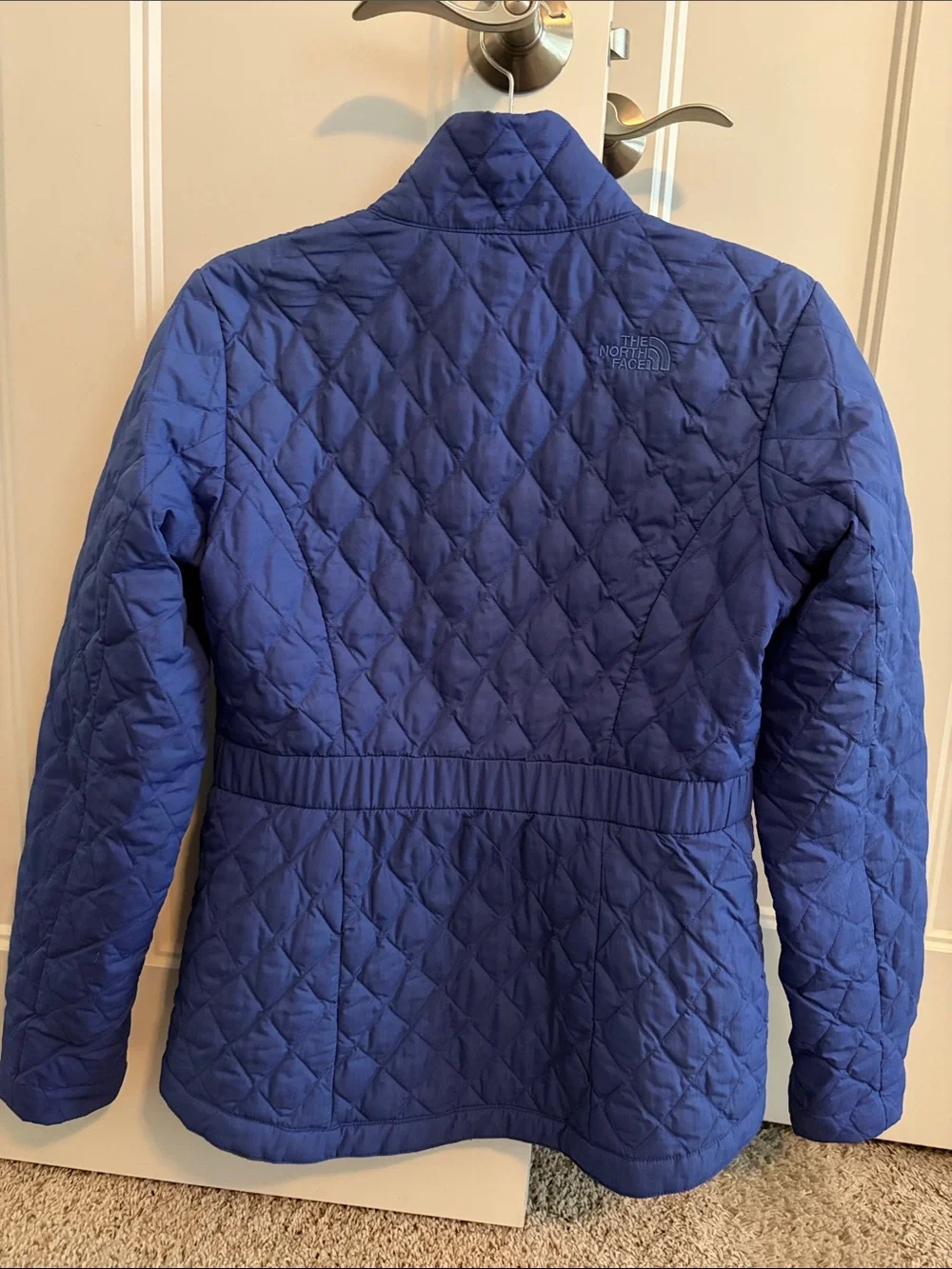 The North Face Women's Quilted Puffer Jacket in Purple/Blue